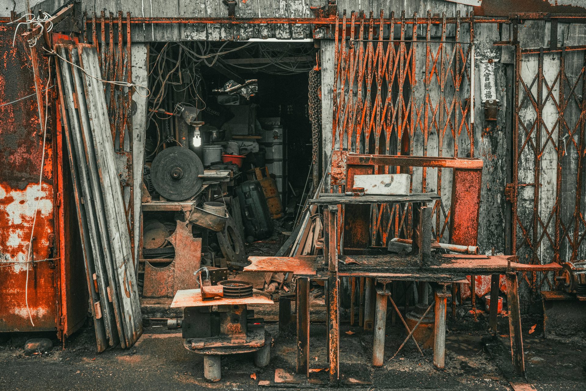 an old building with a lot of junk on it