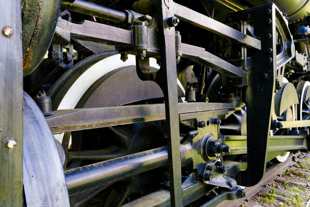 a close up of the wheels of a train
